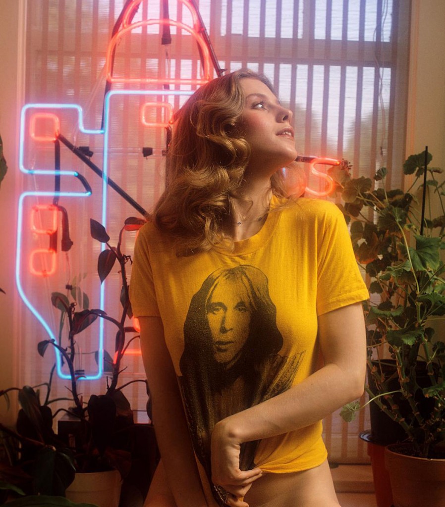 Bebe Buell wearing a Todd Rundgren t-shirt.